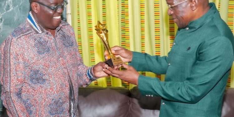 Speaker of Ghana’s Eighth Parliament, Rt. Honourable Alban Sumana Kingsford Bagbin receiving the award from Dr Eric Osae, Director-General of the Internal Audit Agency (IAA), during a ceremony at Parliament House