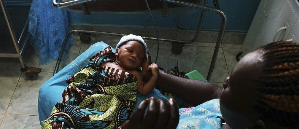 A women Holding a Baby Fertitility Versus Hormonal Changes 1