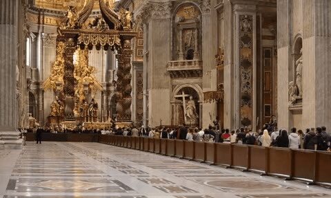 Mourners line up in St Peter’s Basilica to pay homage to Pope Francis before his funeral.