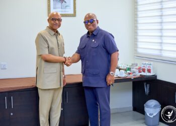 UNICEF Representative to Ghana, Mr. Osama Makkawi Khogali, meets with Chief Executive of the NHIA, Dr. Bampoe