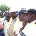 Roads Minister Hon. Governs Kwame Agbodza inspecting the architectural design of the Afraim Plains River Bridge