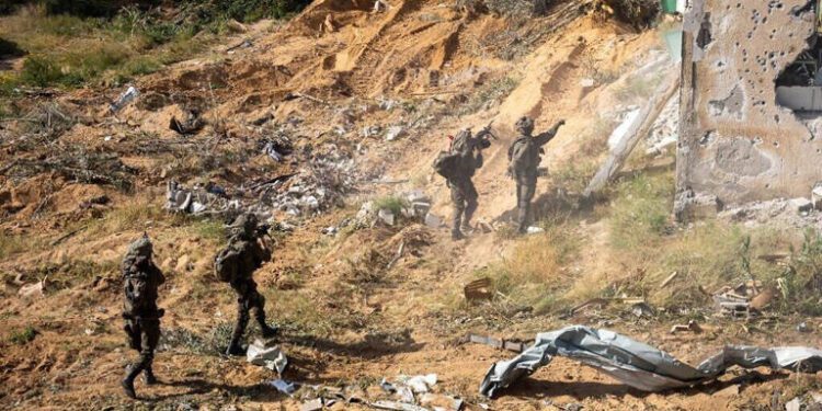 Troops of the 36th Division operate in the Morag Corridor in the southern Gaza Strip, in a handout photo issued on April 12, 2025.