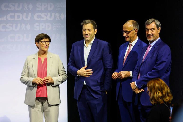 Social Democratic Party of Germany (SPD) co-leader Saskia Esken, Designated German Vice Chancellor and Designated Finance Minister Lars Klingbeil, Incoming German Chancellor and leader of the Christian Democratic Union (CDU) Friedrich Merz and Christian Social Union (CSU) leader and Bavarian Premier Markus Soeder stand on the day of an event for the signing of the coalition government agreement between CDU, CSU and SPD, at the Gasometer in Berlin, Germany May 5, 2025.