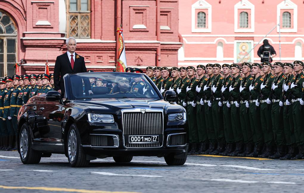Russia’s Defence Minister Andrei Belousov on an Aurus Senate convertible reviews troops during a Victory Day military parade in Red Square