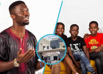 Kwaku Manu with his children