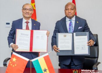 Ghana's Foreign Minister, Hon. Samuel Okudzeto Ablakwa and Chinese Ambassador to Ghana, His Excellency Tong Defa at the signing of the Grant