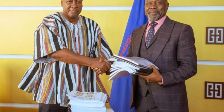 President Mahama handingover ORAL Committee's findings to Attorney General and Minister for Justice Dr Dominic Ayine