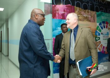Mr. Simon Madjie, GIPC CEO with U.S. Chargé d’affaires Mr. Rolf Olson