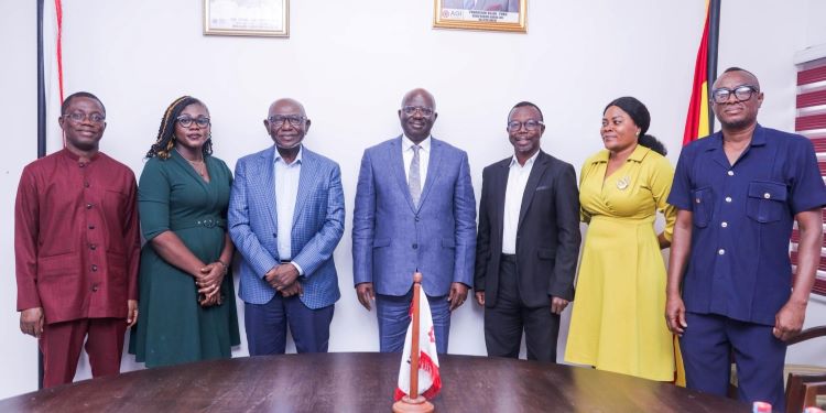 Mr. Felix Addo, CIRIP President, with Pharm. Kofi Nsiah-Poku, President of AGI, and Delegates