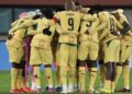 Ghana players form a huddle before Austria game