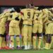 Ghana players form a huddle before Austria game
