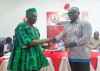 GAMLS President, Dr. Eric Kofi Aidoo with Oti Regional Minister, John Kwadwo Gyapong