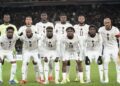 Black Stars team take a pre-match photo in Stuttgart