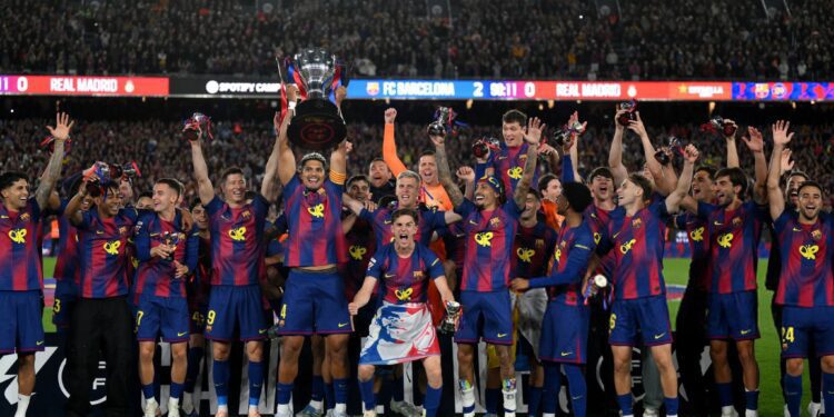 Captain Ronald Araujo lifts the La Liga title in front of the Camp Nou crowd