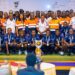Players of Medeama SC and the staff of AngloGold Ashanti Iduapriem Mine take a picture with the GPL trophy