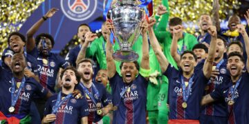 PSG captain, Marquinhos lifts the Uefa Champions League title after beating Arsenal in the final in Budapest