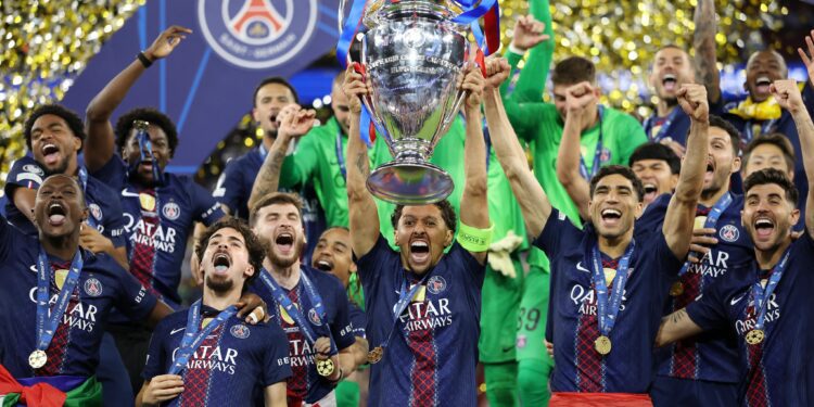 PSG captain, Marquinhos lifts the Uefa Champions League title after beating Arsenal in the final in Budapest