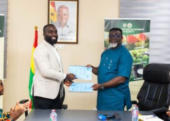 Dr. Andy Osei Okrah, TCDA CEO, signs MoU with Mr. Kirk Agyekum, PABD CEO