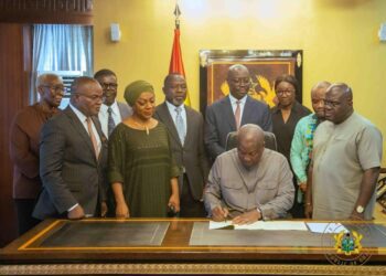 Picture of HE President John Dramani Mahama and other Government Officails signing the Value for Money Office Bill 2026 into law