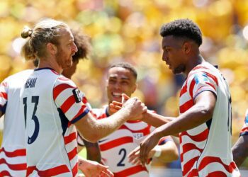 Pochettino Makes History as USA Secure Their Place in The Last 32 6 Alex Freeman congratulated by his teammates after scoring his first World Cup goal