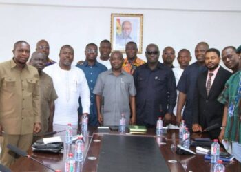 Hon. Sampson Ahi, Deputy Minister of Trade, Agribusiness, and Industry, with Hon. Alexander Roosevelt Hottordze, Chairman of the Parliamentary Select Committee on Trade, Industry, and Tourism, and Team