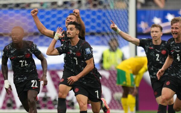 Canada players celebrating after Stephen Eustaquio struck the only goal against South Africa