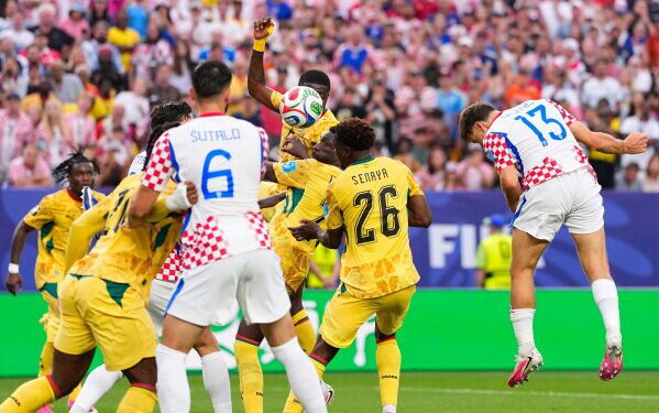 Nikola Vlasic jumps high to head home the corner