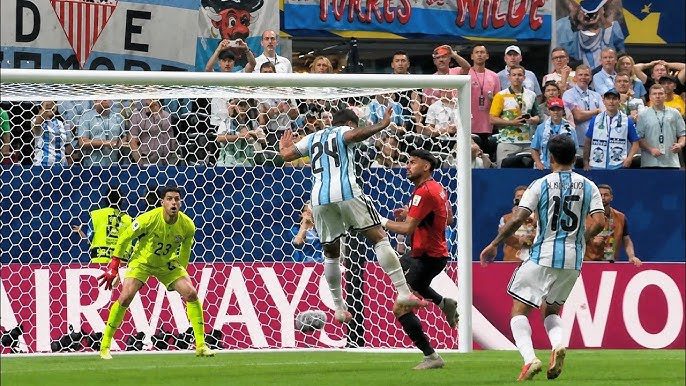 Enzo Fernandez heads in the winner for Argentina against Egypt