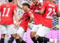 Emam Ashour celebrating with his teammates after giving Egypt the lead against Australia