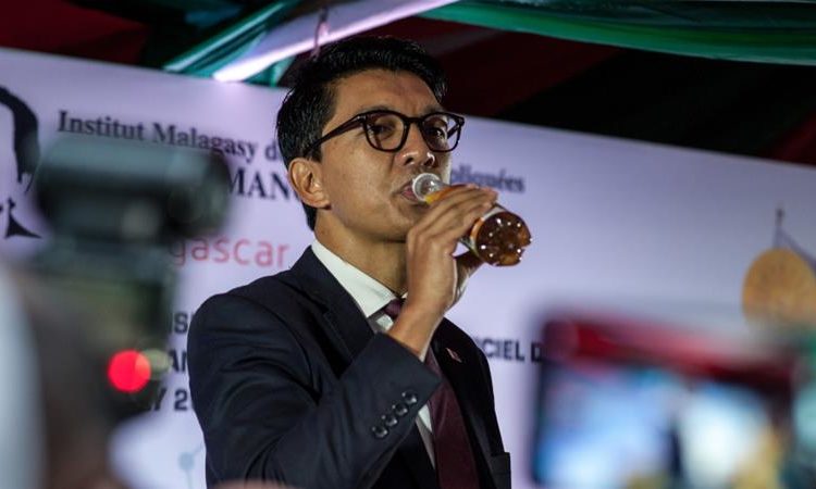 In April, President Rajoelina launched a local herbal concoction he says prevents coronavirus [Henitsoa Rafalia/Anadolu]