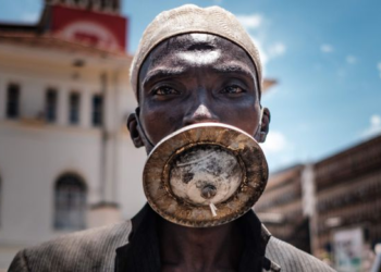 Image Source: BBC Pictures - A man wearing a locally made face mask in Subsaharan Africa
