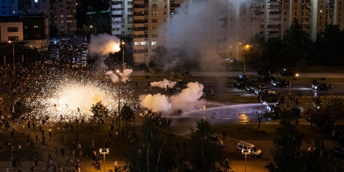 Belarus Election: Opposition Disputes Lukashenko Landslide Win amid Protests 1 Protesters and riot police clash in Minsk, Belarus during a demonstration against President Lukashenko's claim of a landslide victory. Image credit: Misha Friedman/Getty Images)