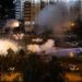 Protesters and riot police clash in Minsk, Belarus during a demonstration against President Lukashenko's claim of a landslide victory. Image credit: Misha Friedman/Getty Images)