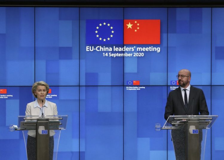 Tear down your barriers, EU presses after summit with China's Xi 1 European Council President Charles Michel, right, and European Commission President Ursula von der Leyen. Image credit: AP