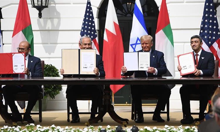 the signing of the historic agreement. Image credit: AFP