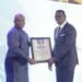 Mr. Justice Yaw Ofori, the Commissioner of Insurance & CEO of the National Insurance Commission (NIC)  receiving his award.