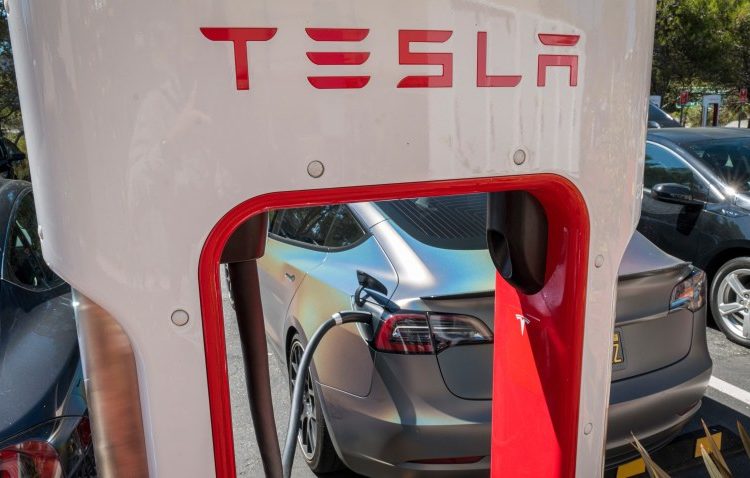 A Tesla Inc. vehicle charges at a charging station in San Mateo, California, U.S. Image: Getty Images