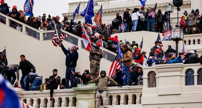 US Congress resumes after violent protestors storm Capitol 1 US Congress resumes after violent protestors storm Capitol