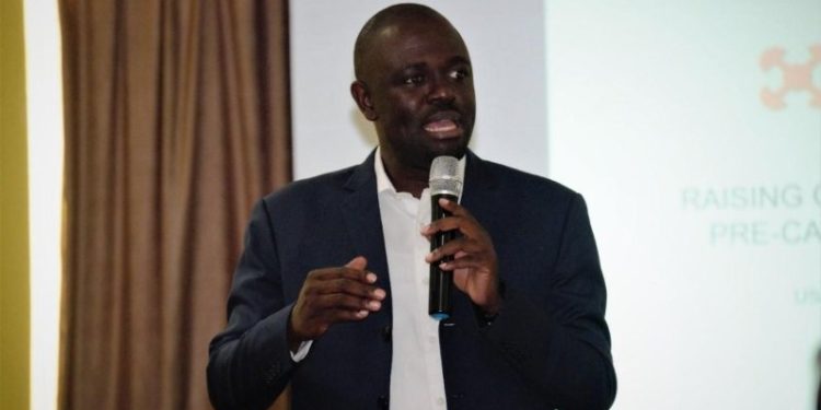 The Strength Of The Cedi In 2020 Was Subtly Influenced By The Suspension Of Dividend Payment – Mr. David Tetteh 1 Mr. David Tetteh, Investment Banker, and Former CEO of Cal Brokers