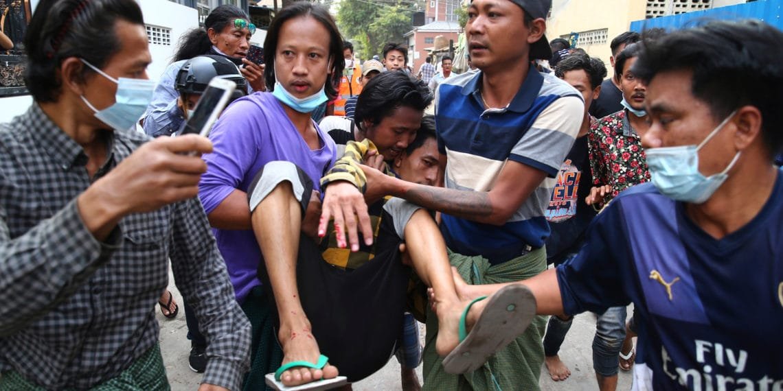 Eleven killed as Myanmar protestors ‘fight soldiers with rifles’