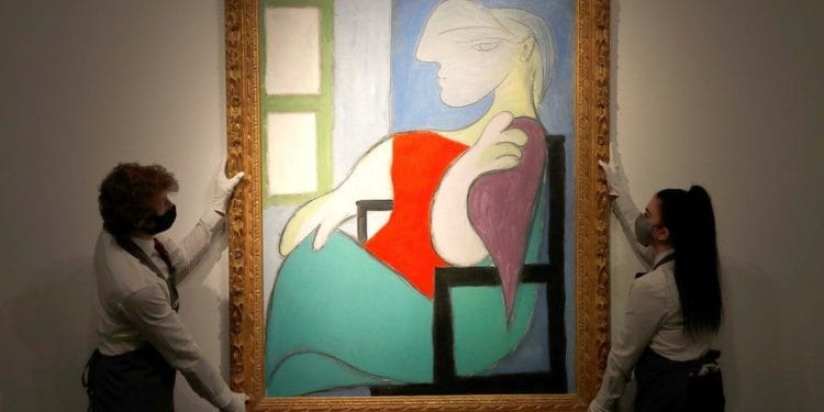 Pablo Picasso's painting, 'Woman sitting by a window (Marie-Therese)' sold for 103.4 million dollars at Christie's in New York.