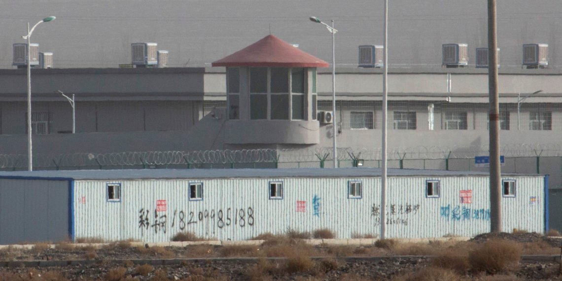 China decries planned UN event on Xinjiang, describes as insult 1 A guard tower and barbed wire fences around a facility in Artux in western China's Xinjiang region