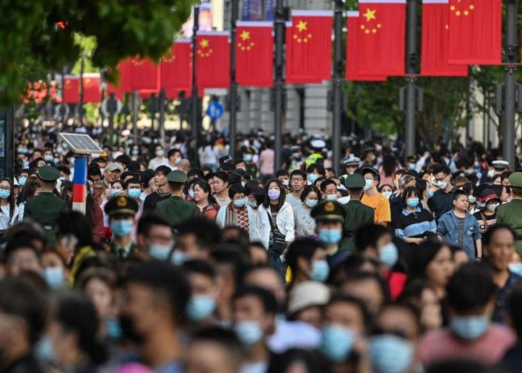 China’s population growing at slowest rate in decades 1 China’s population growing at slowest rate in decades