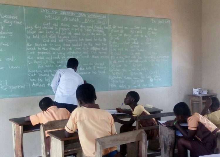 Teaching Profession Under Threat- Henry Akoto 1 A teacher teaching a class