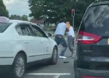 A newly elected mayor was filmed fighting with a taxi driver in the street in a horrifying road rage incident