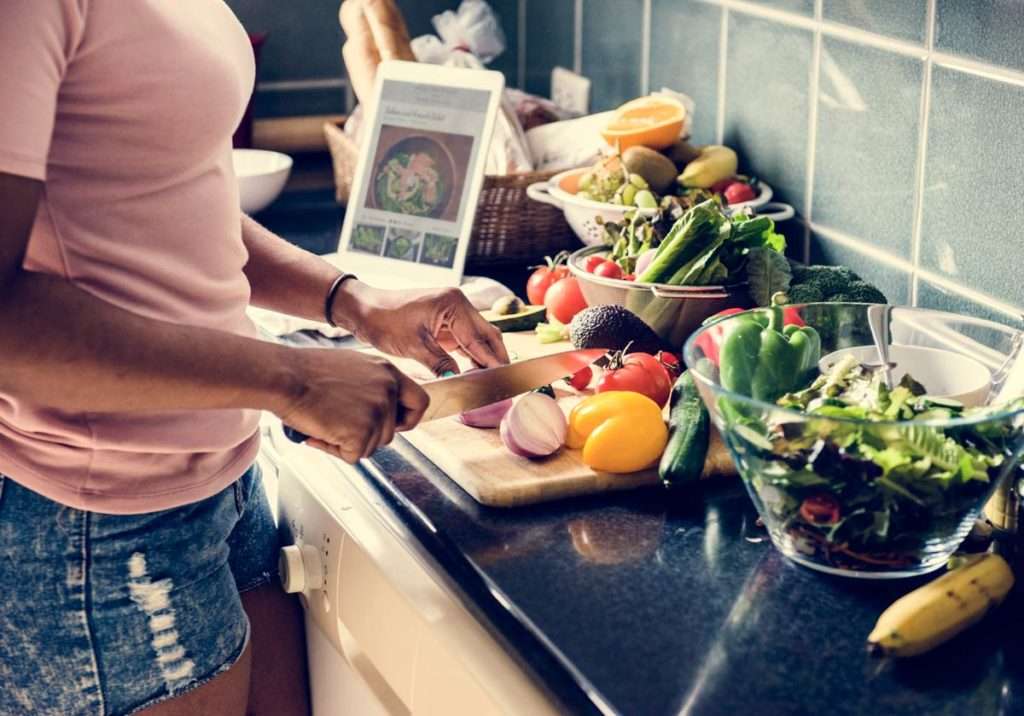 Black woman cooking in the kitchen