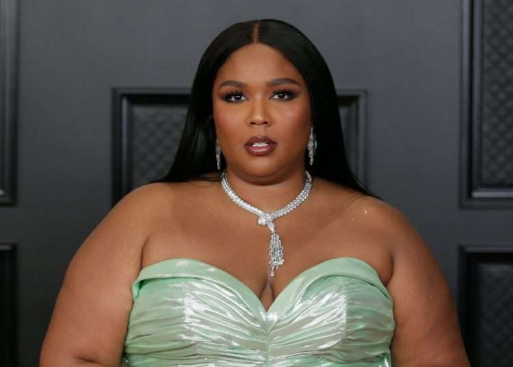 Lizzo claps back at fat-phobic and racist messages 1 Grammy winner, Lizzo has clapped back at some "fat-phobic" and "racist" attacks days after she and Cardi B released the music video for their new song collaboration, 'Rumors'.