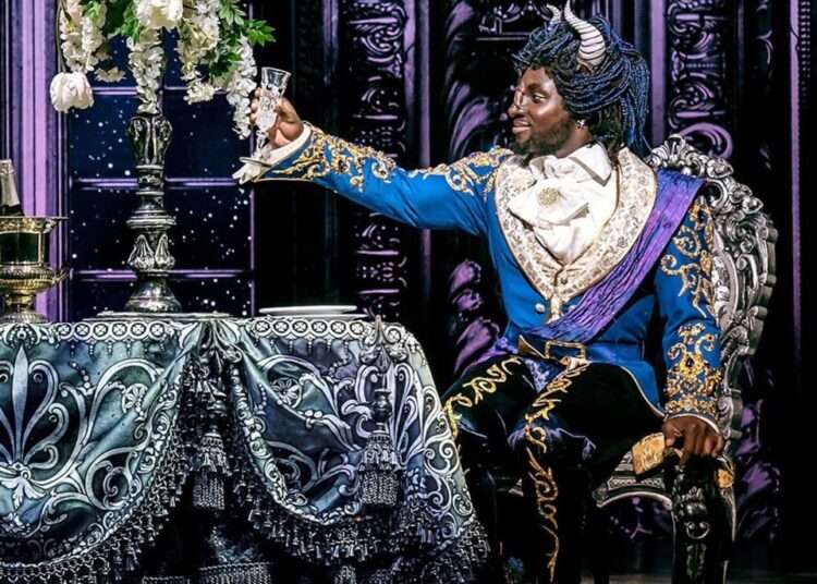 'Beauty And The Beast' musical star suspended over inappropriate comments to a female crew member 1 'Beauty And The Beast' musical star suspended over inappropriate comments to a female crew member Emmanuel Kojo, the first black actor in 'Beauty And The Beast' in the UK has reportedly been removed from the cast over allegations of inappropriate language after a dozen cast members and creatives threatened to quit unless bosses investigated the allegations. The 29-year-old had been playing the lead role of the Beast in the musical until after investigations when he was suspended from the show. According to reports, he was removed from the touring production at Liverpool's Empire Theatre following allegations of inappropriate language and suspended while a full investigation was carried out. Currently, another actor, Alyn Hawke who is an understudy, has taken over the role. Arin Hawk plays the Beast in Disney Classics until tomorrow night when the show tour will come to an end. Meanwhile, Disney reacting to the allegations in a statement noted that: "We are aware of a complaint, which we take very seriously, and a thorough investigation is underway. The employee in question has been suspended until the matter is resolved". One source also said: "The woman thinks his behavior is unacceptable. "He is alleged to have been on the stage and commented on her views on the female members of the crew. She was very uncomfortable and I heard comments." The suspension comes days after Kojo announced that he would be taking a break from social media. His post on his Twitter account read: "Little social media break for the mind in 3,2,1…". Some netizens took to social media to share their opinion on the issue. While some are in solidarity with the actor and wish him well, others were in rage as they noted that it served him right. Agreeing with Emmanuel Kojo's break, some were also of the view that going off social media was the best thing to do because he is definitely going to receive several hate comments. That notwithstanding, some netizens opined that if he indeed passed such inappropriate comments, then he should not only be suspended but completely sacked from the theatre show. It can be recalled that Emmanuel Kojo was revealed as a cast in the “Beauty and the Beast’ Broadway show earlier this year. He mentioned that his casting in 'Beauty And The Beast’ has been a “real moment” for him. Ebo Whyte set to hit National Theatre for live shows According to information on Disney's official site, Emmanuel is an activist as well as a performer and is currently serving his third term on Equity's Council. It is worth mentioning that he recently spearheaded the campaign against racist reviews and racism in the arts and entertainment industry in The Stage newspaper, the result of which was a set of guidelines for critics agreed between Equity and the NUJ (National Union of Journalists). That notwithstanding the actor, born in Ghana, has twice been nominated for Olivier Awards – for his performances as Joe in 'Show Boat and Jud Fry in Oklahoma'. He also has starred in productions including, 'Twelfth Night', at the National Theatre, and 'The Scottsboro Boys', at the Young Vic. Read also: I will not “monetize” flagbearership race- Boakye Agyarko