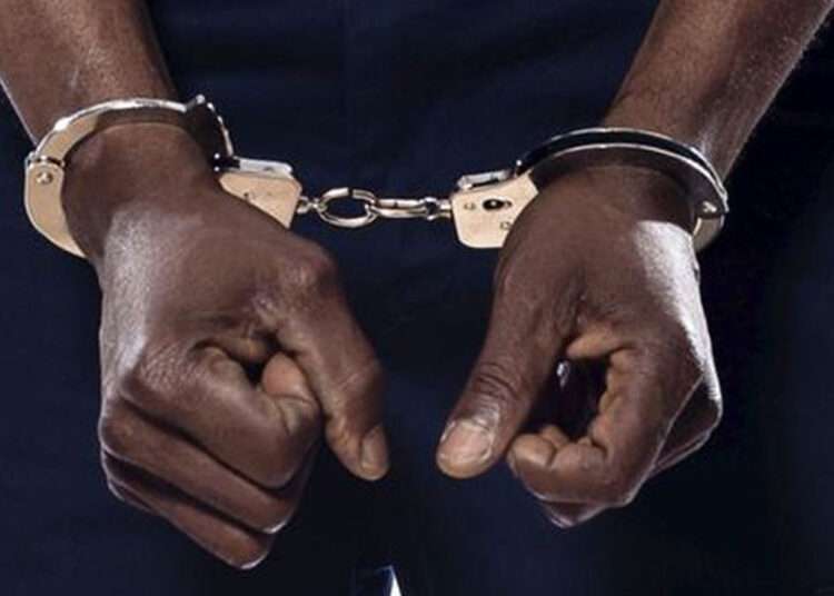 Hundreds of Inmates Freed as Gunmen Attack Nigerian Prison 1 A handcuffed hand