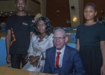 An albino activist was sworn into Malawi's parliament, a first in a country where people with albinism have suffered discrimination and killings.